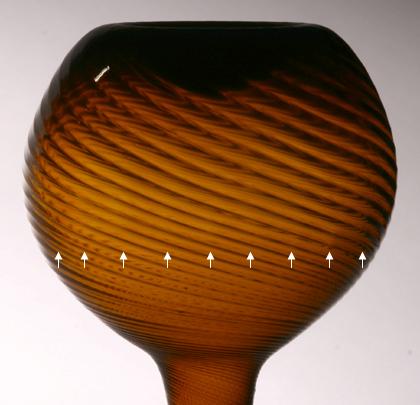 Subtle Vertical Ribs on a Tightly Swirled Zanesville Globular Bottle (103J)